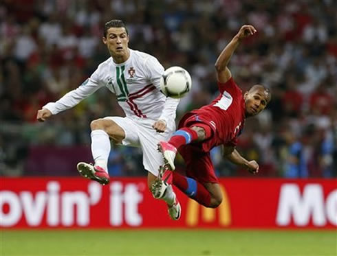 Cristiano Ronaldo fighting in the air against Selassie, at the EURO 2012