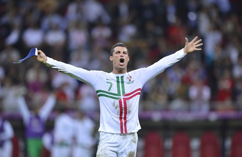 Cristiano Ronaldo opening his arms and thanking everyone for helping Portugal to get through into the EURO 2012 semi-finals