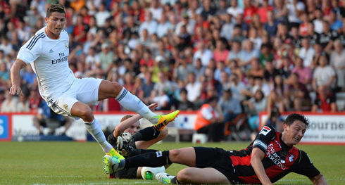 Cristiano Ronaldo getting tackled by two Bournemouth defenders at the same time, in 2013-2014