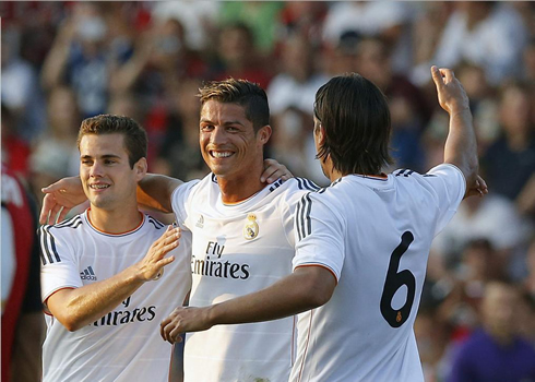 Cristiano Ronaldo with Nacho and Khedira, celebrating Real Madrid goal against Bournemouth, in pre-season friendly in 2013