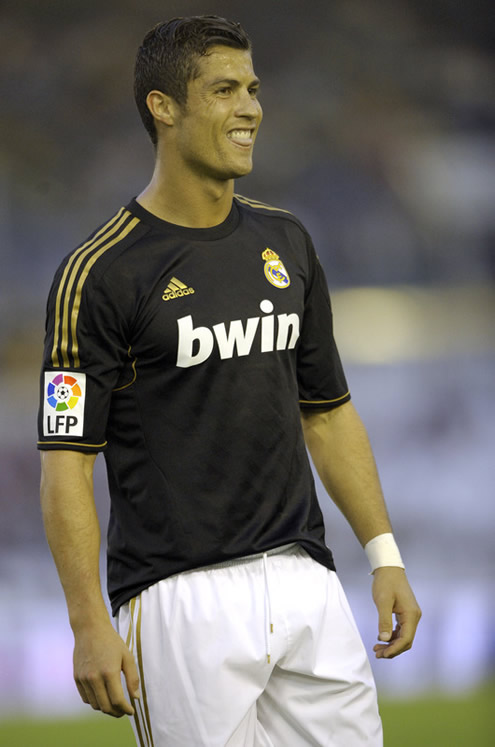 Cristiano Ronaldo biting his tongue in Racing Santander vs Real Madrid, La Liga match in 2011-2012