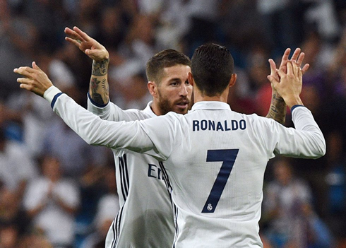 Sergio Ramos and Cristiano Ronaldo saluting each other