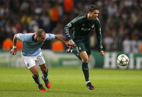 Cristiano Ronaldo trying to escape Zabaleta tight marking, in Manchester City 1-1 Real Madrid, for the UEFA Champions League 2012-2013