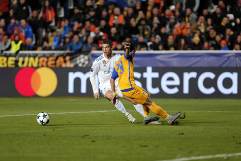 Cristiano Ronaldo dribbling an opponent and leaving him on the ground