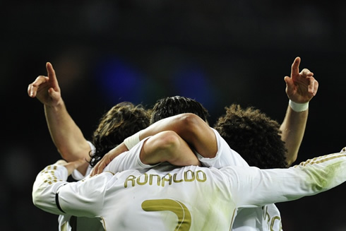 Cristiano Ronaldo hugging Granero and Marcelo in Real Madrid 2012