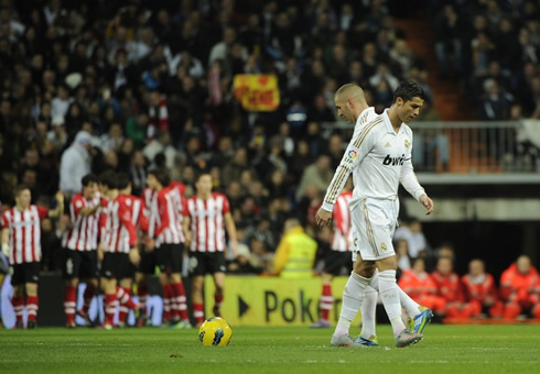 Athletic Bilbao celebrate the opener, while Cristiano Ronaldo and Benzema look down