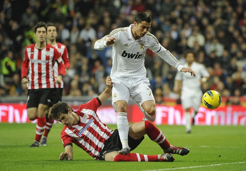 Cristiano Ronaldo being tackled from behind against Athletic Bilbao
