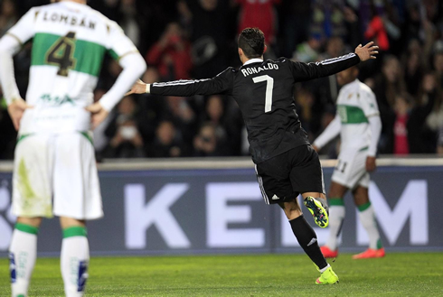 Cristiano Ronaldo runs around the pitch with his arms open