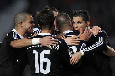 Cristiano Ronaldo hugging his teammates after another goal for Real Madrid in La Liga