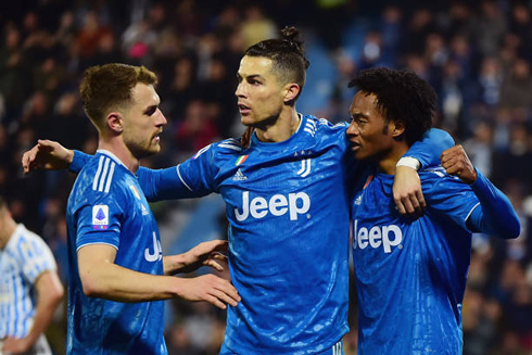 Cristiano Ronaldo with Aaron Ramsey and Cuadrado, after a Ronaldo goal