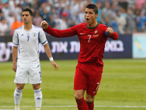 Cristiano Ronaldo celebrating Portugal goal against Israel, in a qualifier for the 2014 FIFA World Cup in Brazil