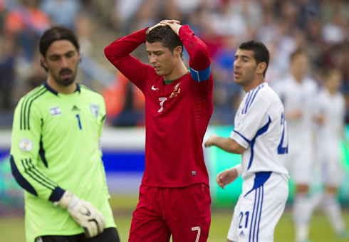 Cristiano Ronaldo putting his hands on his head, after a wasted goalscoring opportunity, during Israel vs Portugal, in 2013