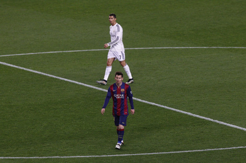 Cristiano Ronaldo and Lionel Messi in the center of the pitch