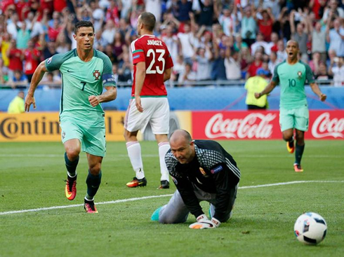 Cristiano Ronaldo running to pick up the ball after scoring the equalizer for Portugal