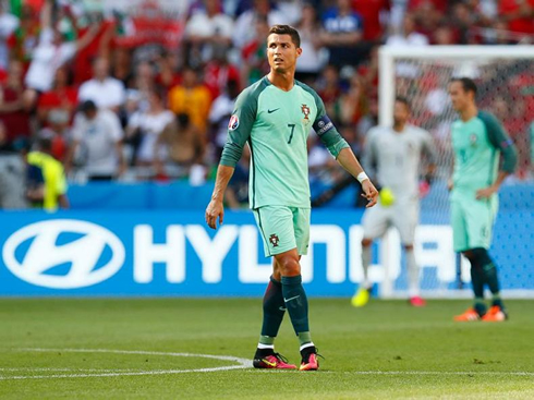 Cristiano Ronaldo waiting for the game to resume after Portugal conceded a goal against Hungary