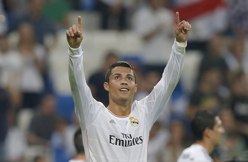 Cristiano Ronaldo points his two fingers to the sky and look at the Bernabéu stands, searching for his son