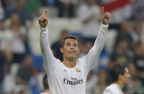 Cristiano Ronaldo points his two fingers to the sky and look at the Bernabéu stands, searching for his son