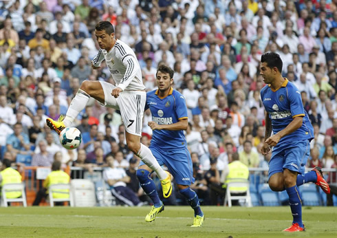 Cristiano Ronaldo controlling the ball in the air, in Real Madrid vs Getafe for the Spanish League 2013-2014