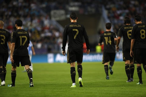 Cristiano Ronaldo walks back to his side for the game to restart