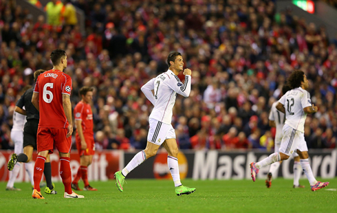 Cristiano Ronaldo running back to his half, after scoring in Anfield for Real Madrid
