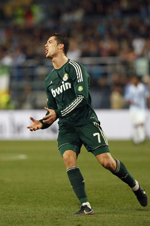 Cristiano Ronaldo bursting out in tears, in a Real Madrid green jersey, in 2012-2013