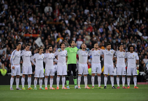 Real Madrid players gathered around the midfield line to respect one minute of silence ahead of the Clasico kickoff