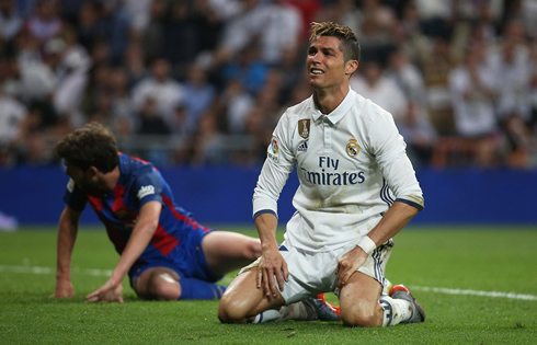Cristiano Ronaldo on his knees after Real Madrid loses El Clasico against Barcelona by 3-2