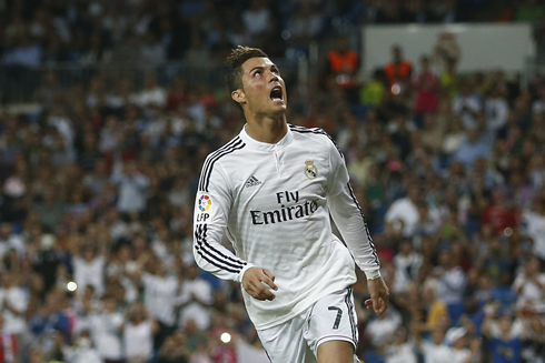 Cristiano Ronaldo looking to the top of the stadium right after he scored another goal for Real Madrid in 2014-2015