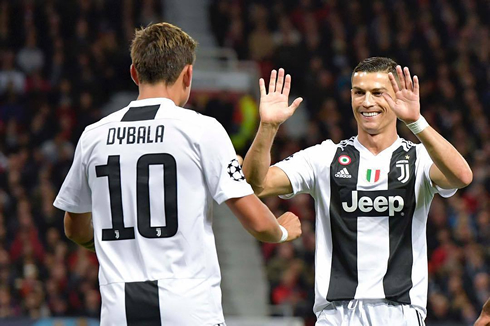 Paulo Dybala and Cristiano Ronaldo celebrating Juventus goal at Old Trafford against Manchester United