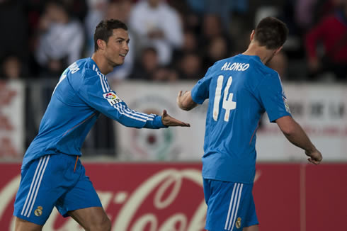 Cristiano Ronaldo hand shaking Xabi Alonso, during a game for Real Madrid in 2013-2014