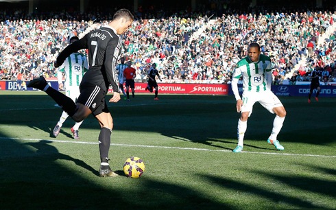 Cristiano Ronaldo preparing to cross the ball with his right foot