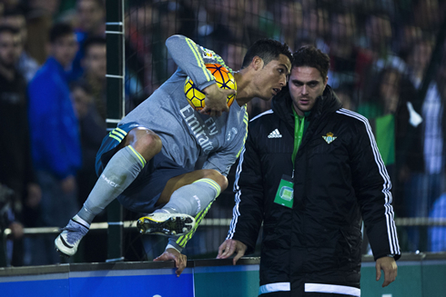 Cristiano Ronaldo jumps an advertising board in the stadium, in Betis vs Real Madrid
