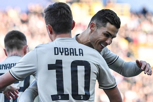 Cristiano Ronaldo and Paulo Dybala celebrate Juventus goal against Bologna