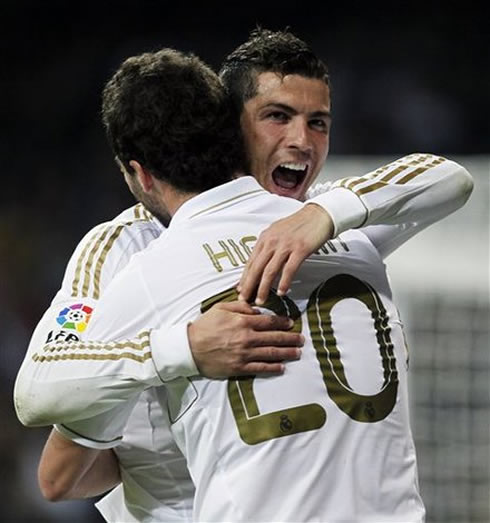 Cristiano Ronaldo joy screaming while hugging Gonzalo Higuaín in Real Madrid 2012