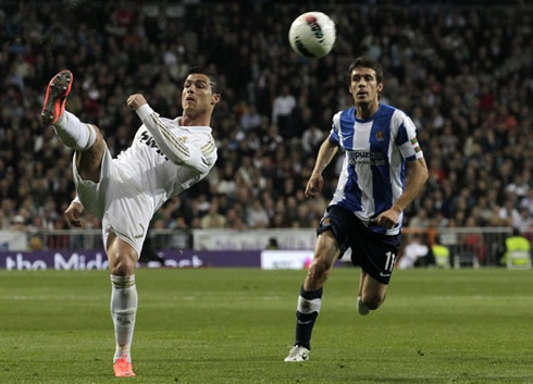 Cristiano Ronaldo showing his great flexibility during a Real Madrid soccer game, in 2012