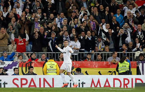 Cristiano Ronaldo celebrating a goal with the Santiago Bernabéu crowd, in a Real Madrid game for La Liga in 2012