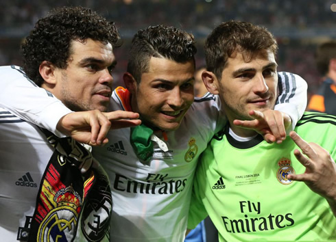 Cristiano Ronaldo, Pepe and Iker Casillas taking a photo in the Champions League 2014 celebrations