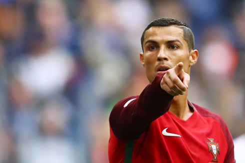 Cristiano Ronaldo pointing his finger forward in a match for Portugal