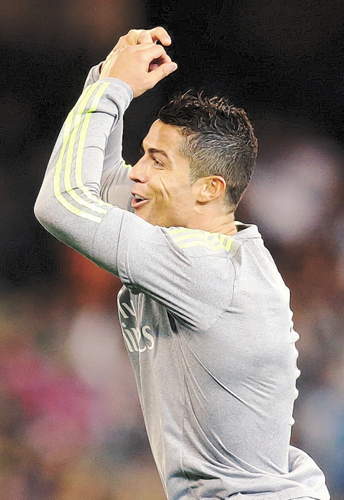 Cristiano Ronaldo looking happy after scoring a goal in a friendly between Real Madrid and Man City