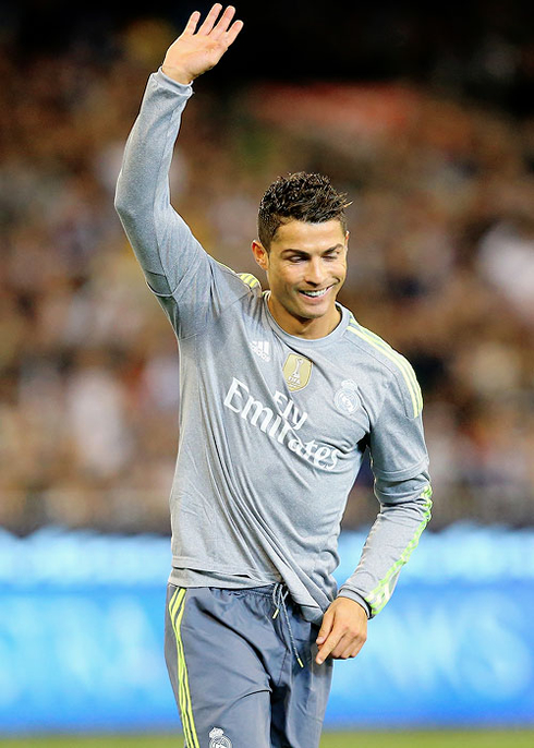 Cristiano Ronaldo raising his hand in a sign of appreciation in Melbourne, Australia