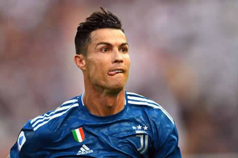 Cristiano Ronaldo biting his tongue
