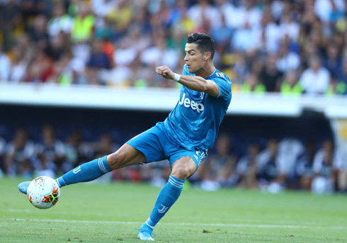 Cristiano Ronaldo striking the ball with his right foot