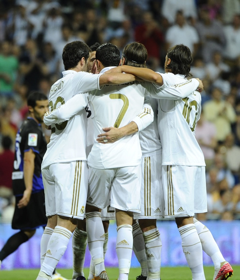 Cristiano Ronaldo hugging his teammates in La Liga Real Madrid vs Rayo Vallecano 2011-2012