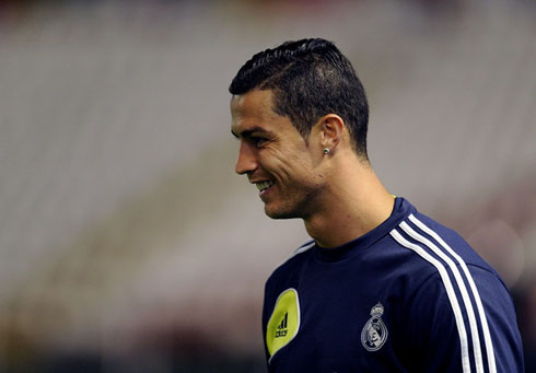 Cristiano Ronaldo smiling during Real Madrid warm-up for the game against Rayo Vallecano, in 2012-2013