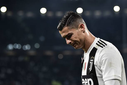 Cristiano Ronaldo puts his head down during a game for Juventus in 2018