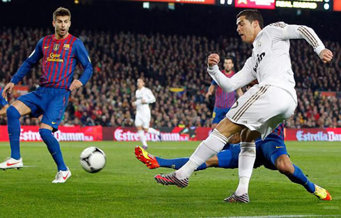 Cristiano Ronaldo left-foot strike, despite the opposition from Daniel Alves and Piqué, in Barcelona vs Real Madrid for the Copa del Rey 2011-2012