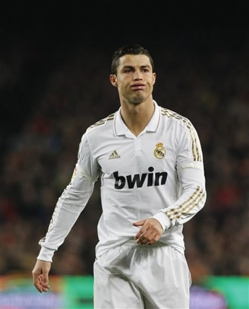 Cristiano Ronaldo making a funny face and expression with his lips, in Barcelona vs Real Madrid 2012