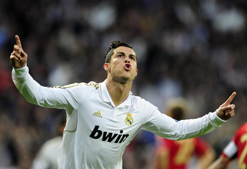 Cristiano Ronaldo points his two fingers up as he celebrates another goal for Real Madrid in 2012