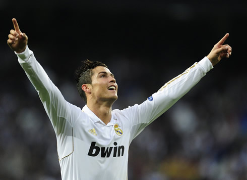 Cristiano Ronaldo stretching his two arms up to celebrate Real Madrid goal against Bayern Munich