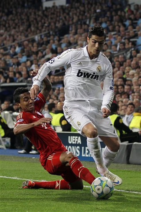 Cristiano Ronaldo suffering a tackle in Real Madrid vs Bayern Munich